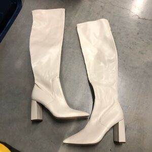White tall boots with block heel and pointed toe
